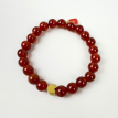 Karneol-Armband für Kinder mit buntem Herzanhänger Karneol-Armband für Kinder mit buntem Herzanhänger